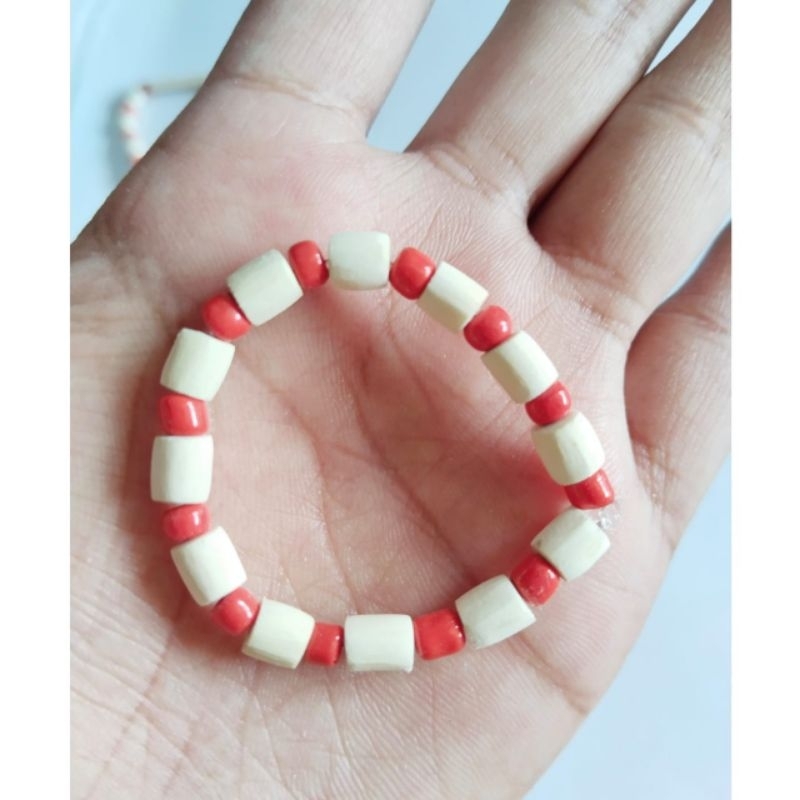 GELANG OTOK BAYI ATAU GELANG SAWAN BAYI MUTIARA WARNA MERAH