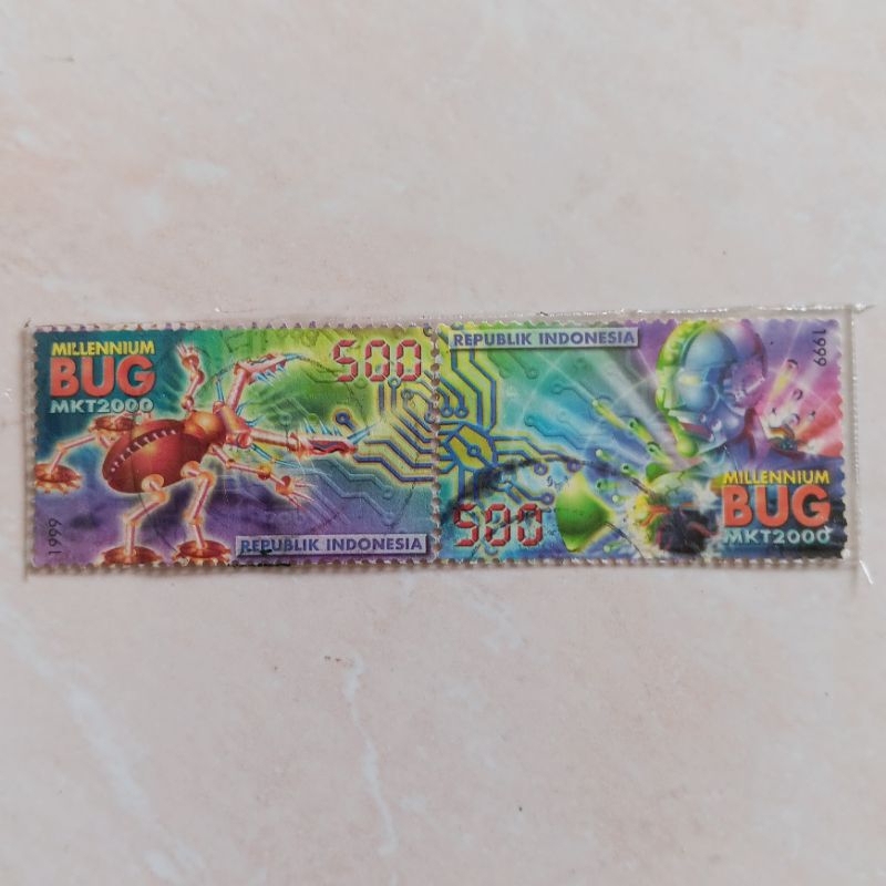

(AB) Perangko Indonesia 1999 Masalah Komputer Tahun 2000 / Millenium Bug Set Lengkap 2pcs Used