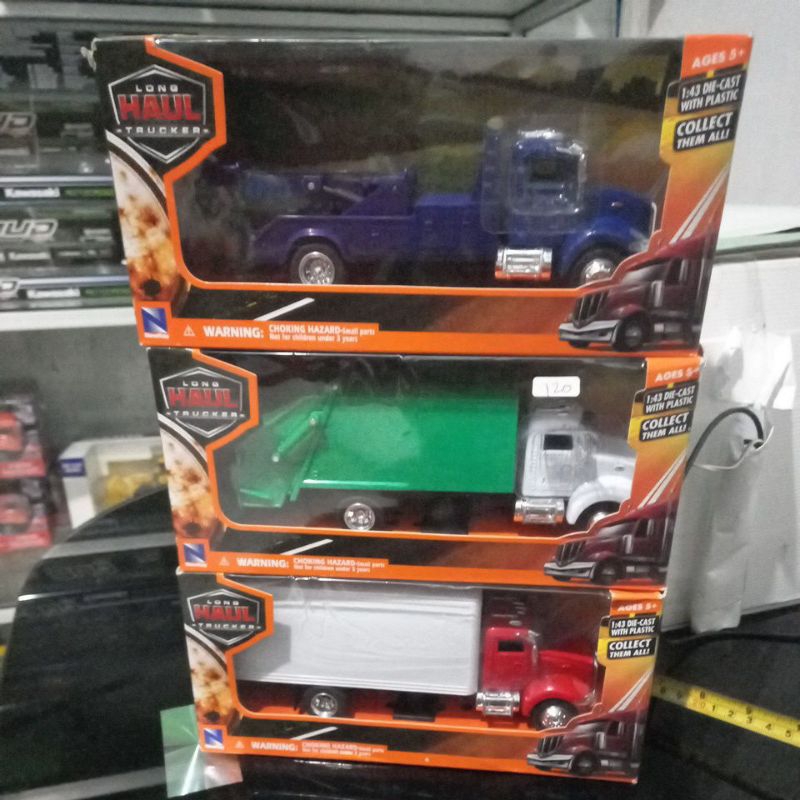 diecast truck peterbilt towing box sampah