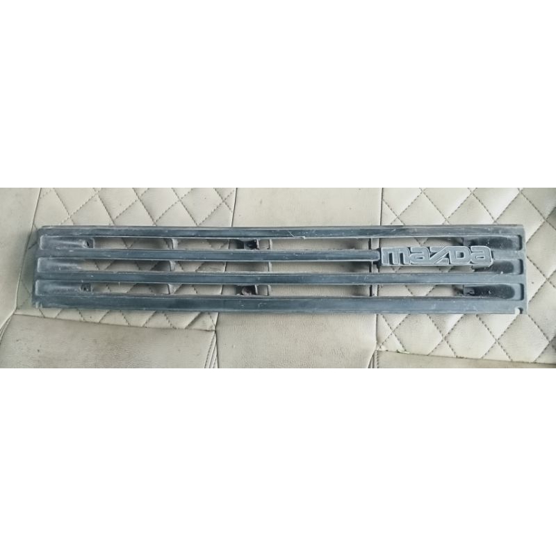 grill mazda 323 trendy elite