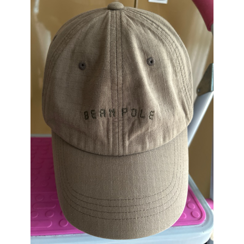 Topi sekon model cap Bean Pole ijo lumut kecoklatan