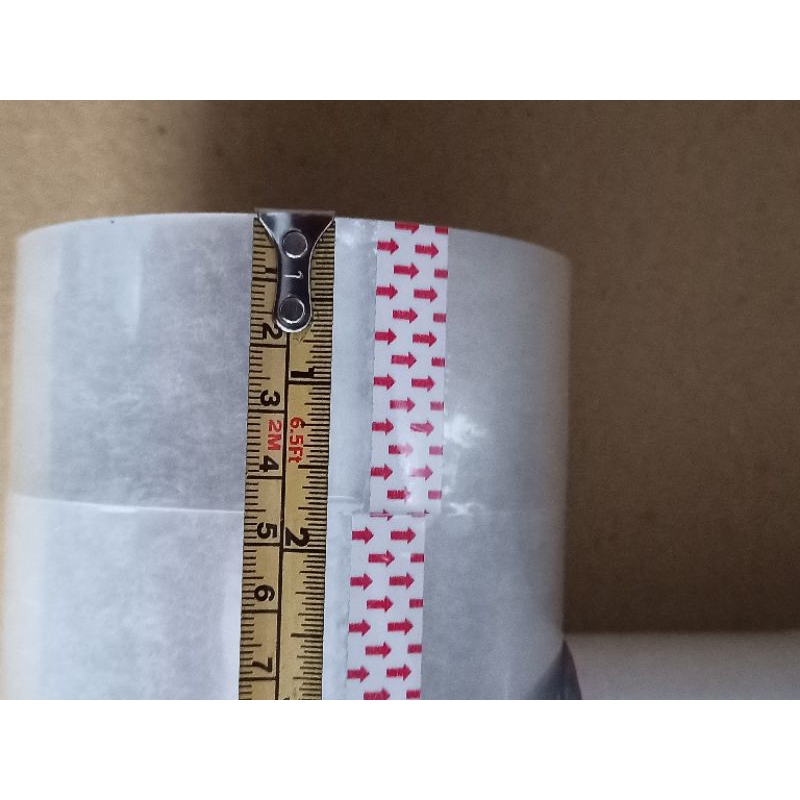 

isolasi lakban perekat merk TOMARU lebar 45mm panjang 100 yard bening kualitas bagus harga murah