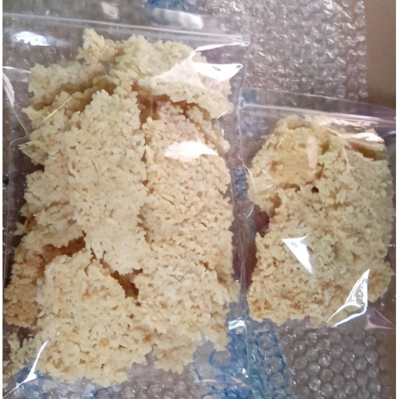 

Intip nasi goreng/kerak nasi goreng asli enak dan gurih berat 250gr (setiap pembelian di atas 5pcs gratis 1pcs kemasan 100gr)