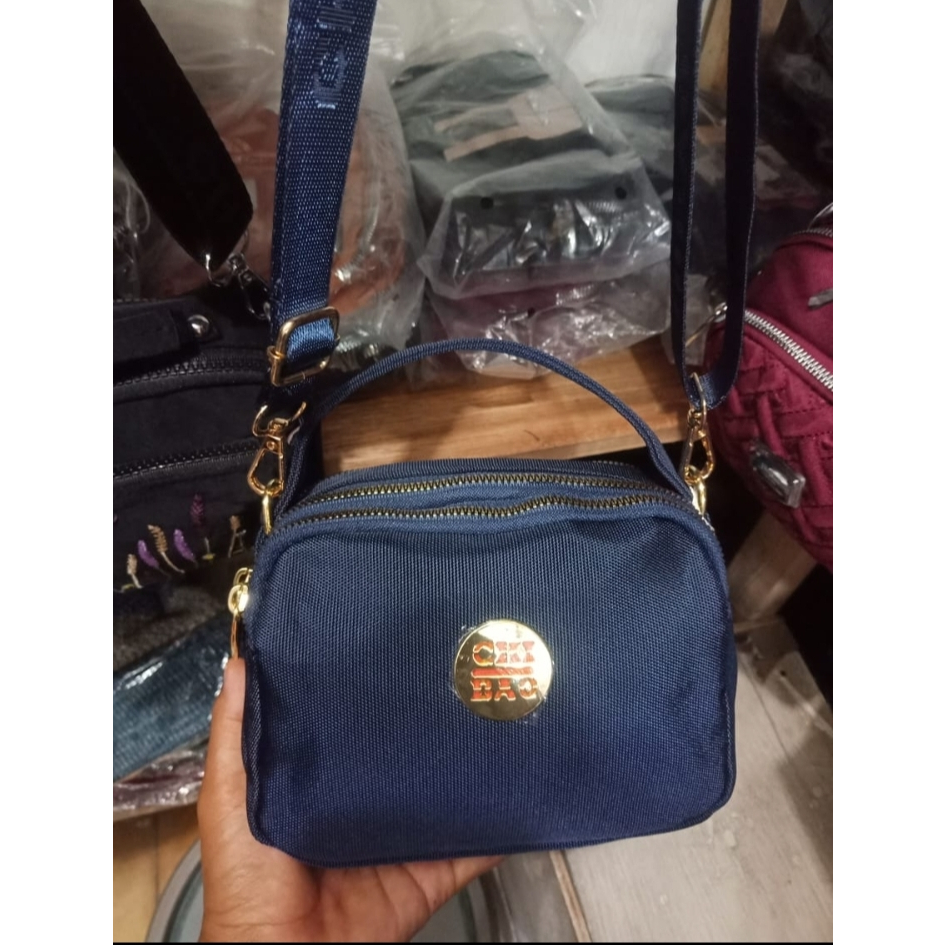 Tas jln ce impor Chibao biru merk emas
