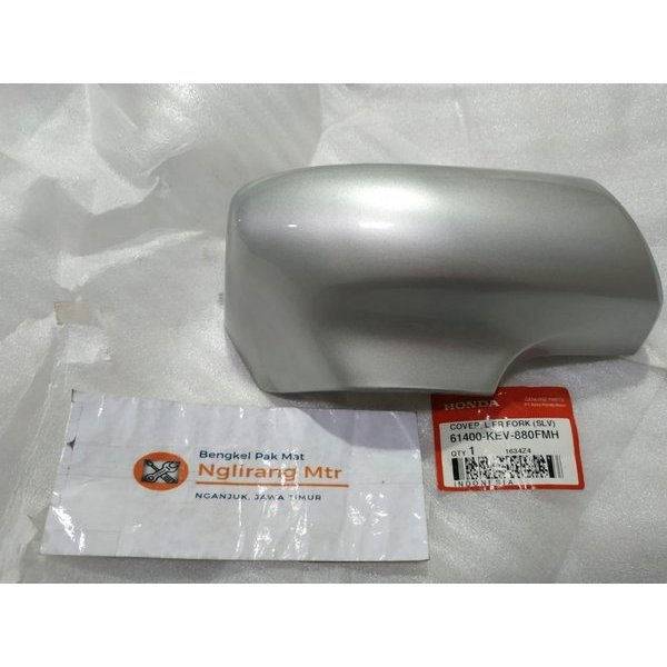 cover skok depan kiri supra lama warna silver kode part 61400 kev 880 fmh