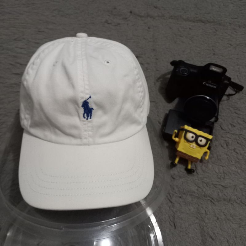 Topi polo warna putih original setelan kulit foto sendiri