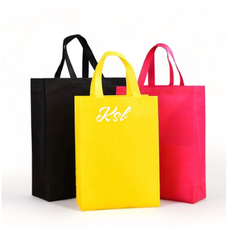 

Tas Spunbond / Tas Kain Belanja / Goodie Bag HLS ( tali lipat samping press bawah ) POLOS 25x35+8