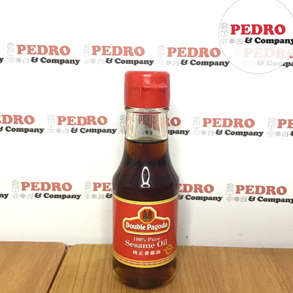 

KODE O89U double pagoda sesame oil 95ml minyak wijen chee seng oil