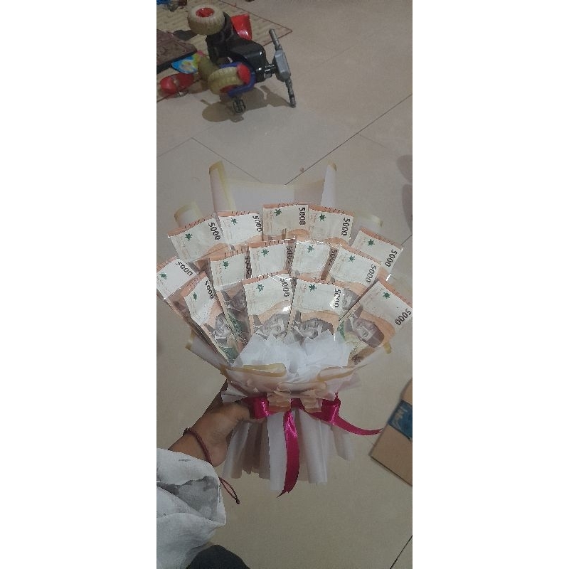 

Buketuang5.000