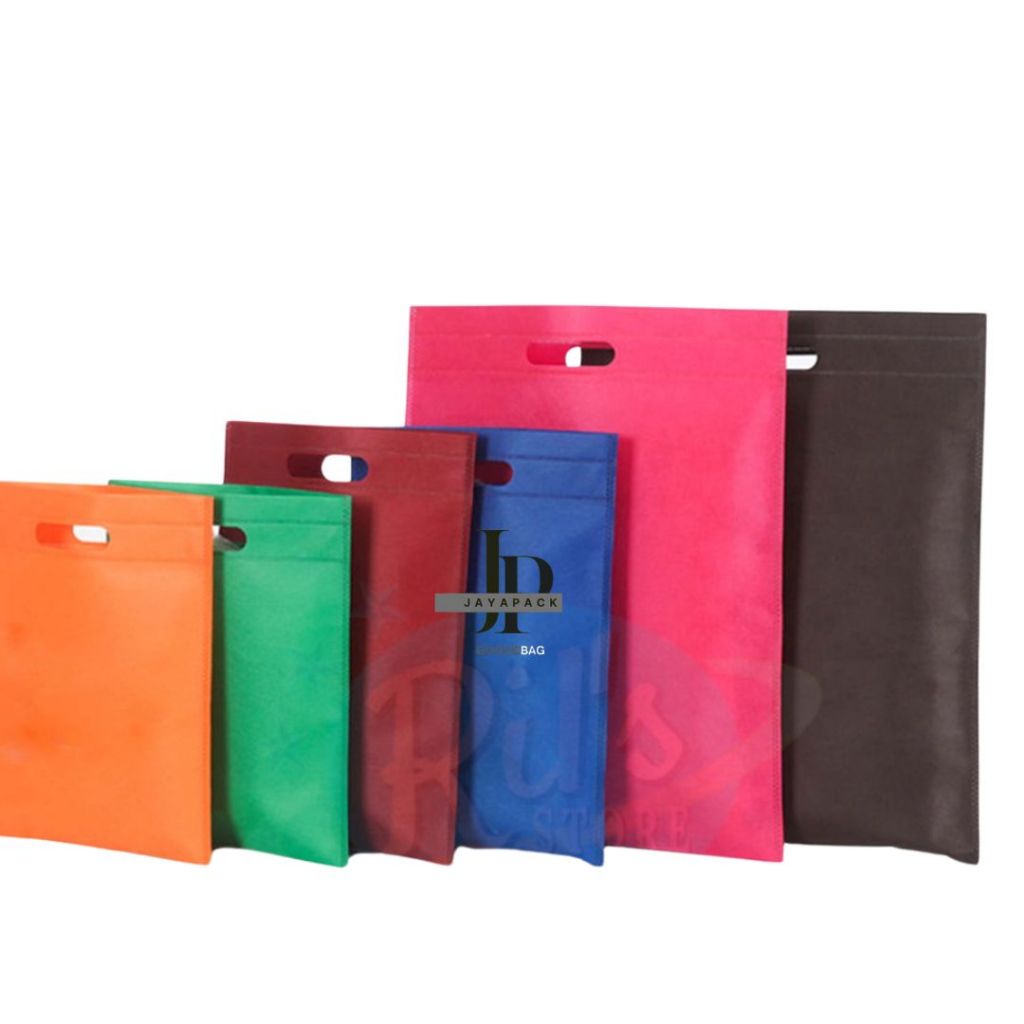 

Tas Spunbond Oval uk 25x35 Goodybag Laken Ekonomis Polos Tebal 70 GSM / tas hajatan / souvenir