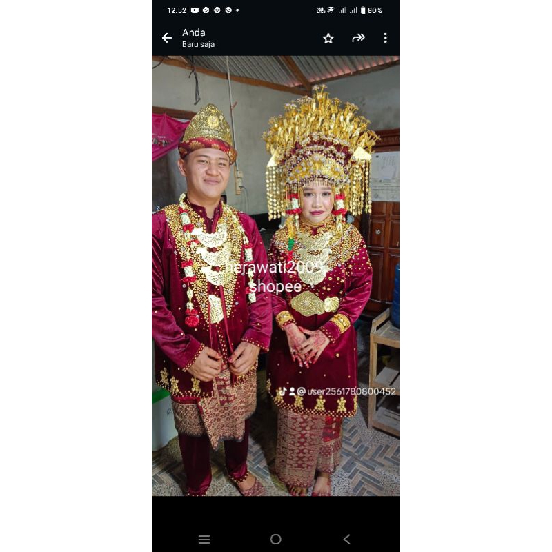 Set baju dan mahkota palembang