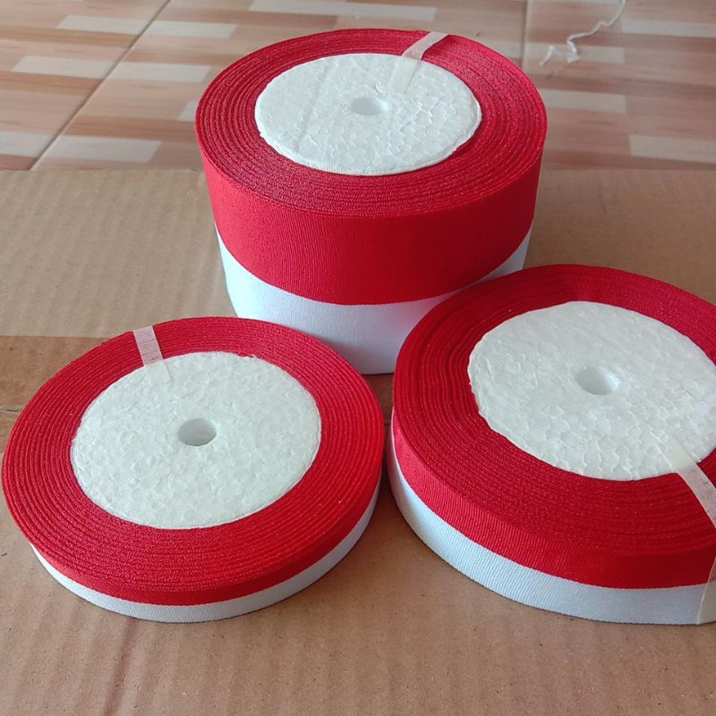 

(1roll) pita kain merah putih panjang 20yard sekitar 18m