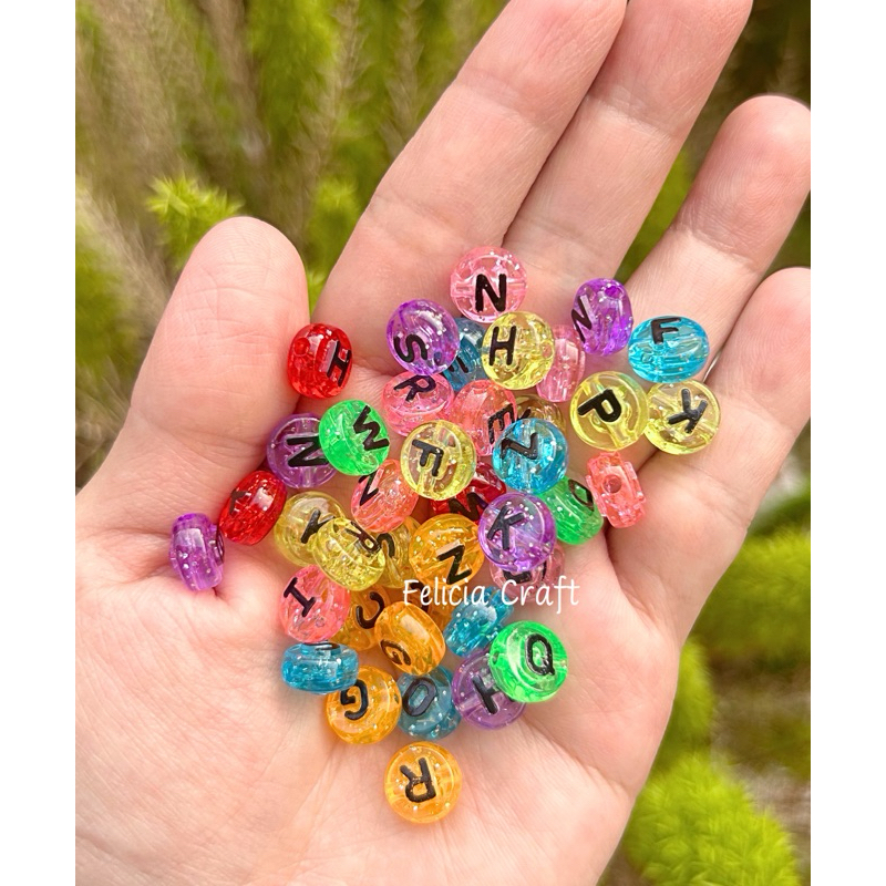 50gr. Manik akrilik huruf bulat transparan glitter 10mm [huruf timbul]