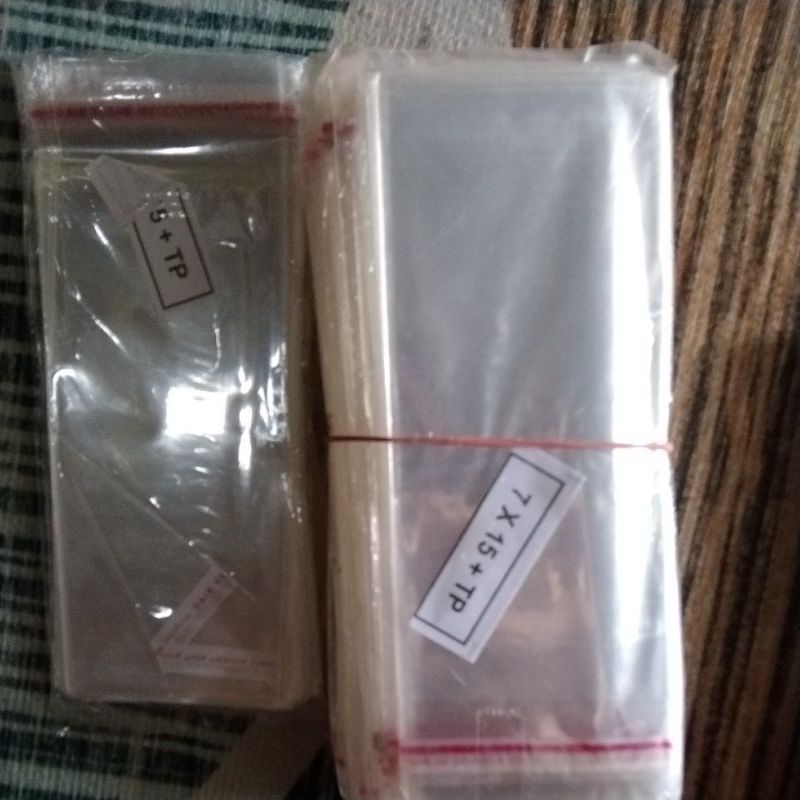 

plastik opp 7*15/bungkus uang buket lem