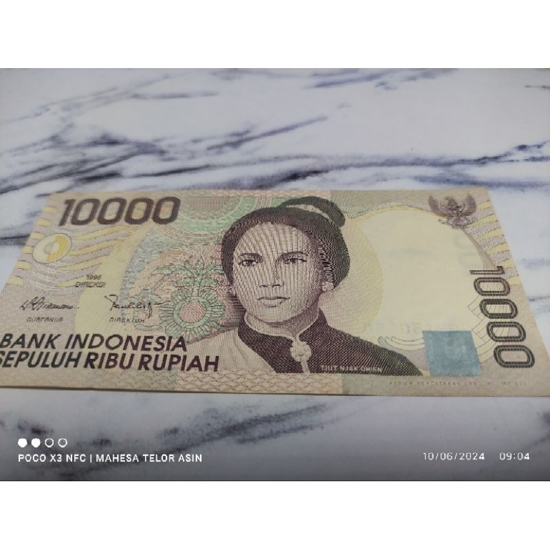 uang kuno 1992 10 rb cut nyak dien 100% ASLI