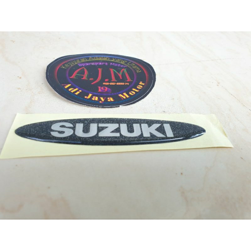 Sticker Logo Emblem Timbul Panel Depan Suzuki Tornado Shogun 110 R Nos