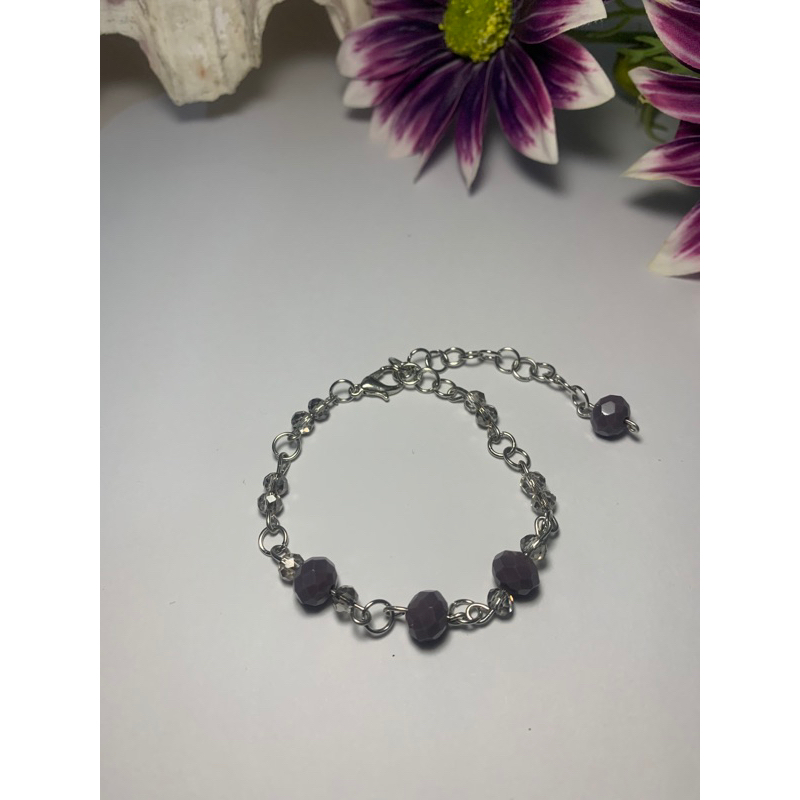 gelang crystal ungu tua