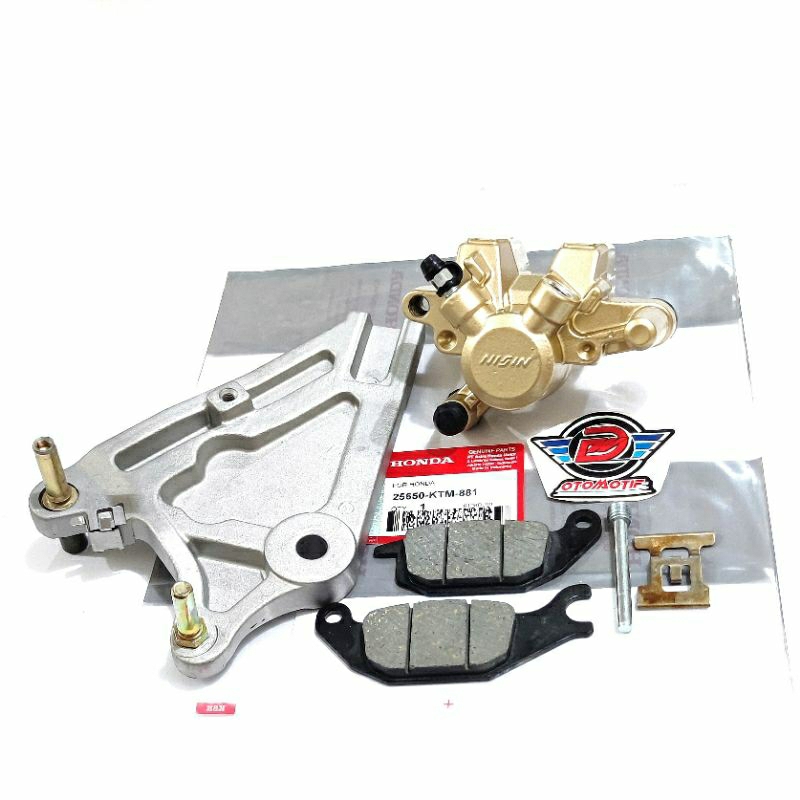 KALIPER CAKRAM BELAKANG+BREKET SUPRA X125, BLADE125 (ORI NISIN)