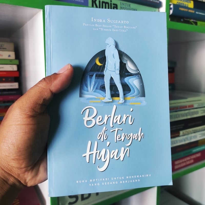 (ori) buku berlari di tengah hujan - indra Sugiarto