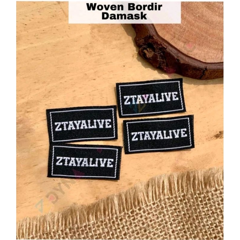 

( Free Desain ) 1x5 cm / label woven / label woven damak / label merek baju / label hijab / label baju / label custom / label bordir