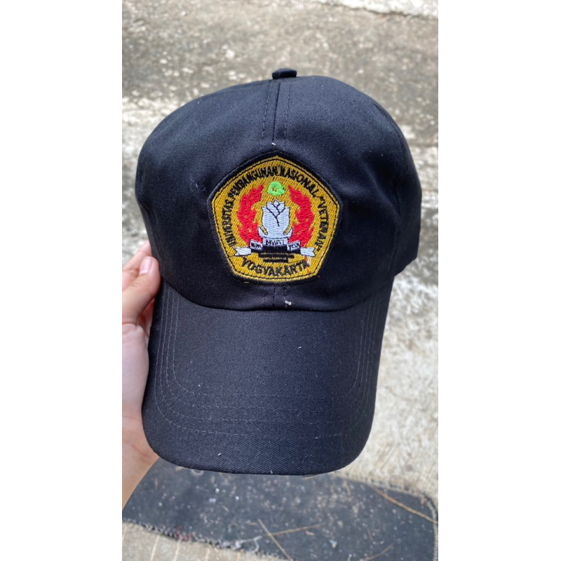 Topi PKKBN logo UPN Veteran Yogyakarta