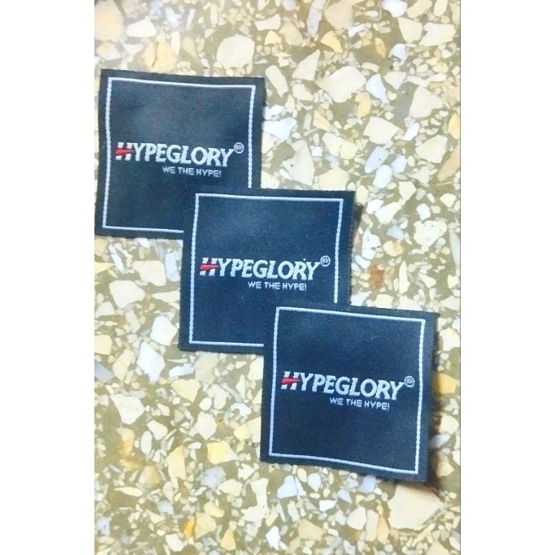 label woven bordir rajut ukuran 4x7 cm minimal order 100 lusin(1200pcs) free hitcut free dsain