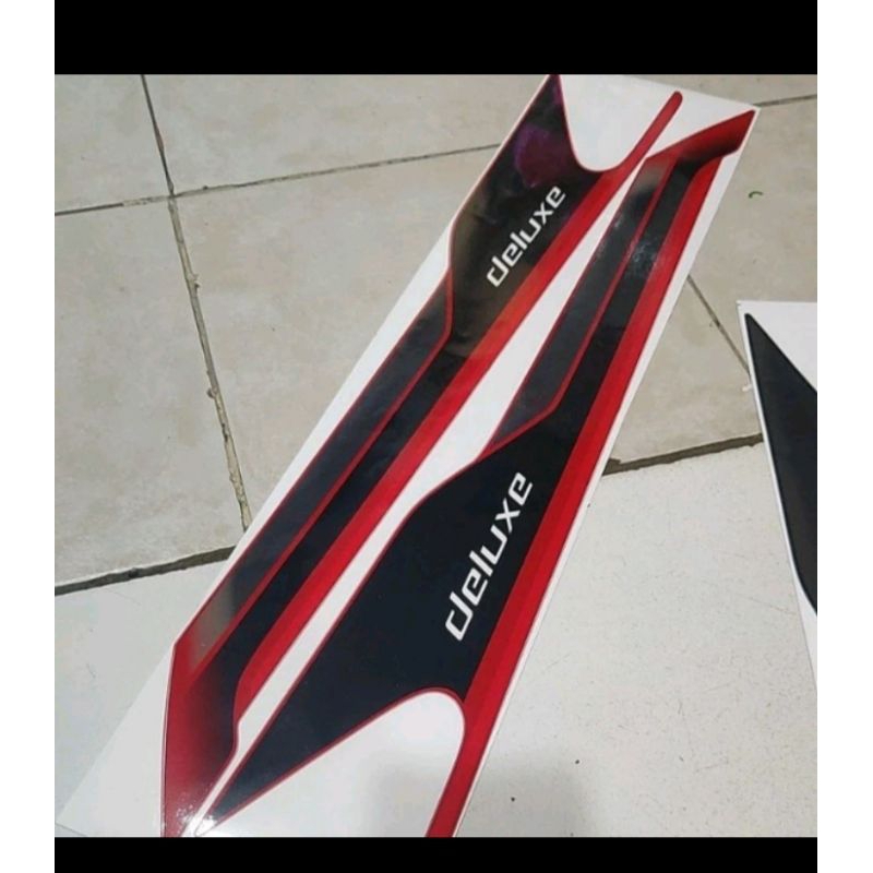 striping lis sigra deluxe 2023