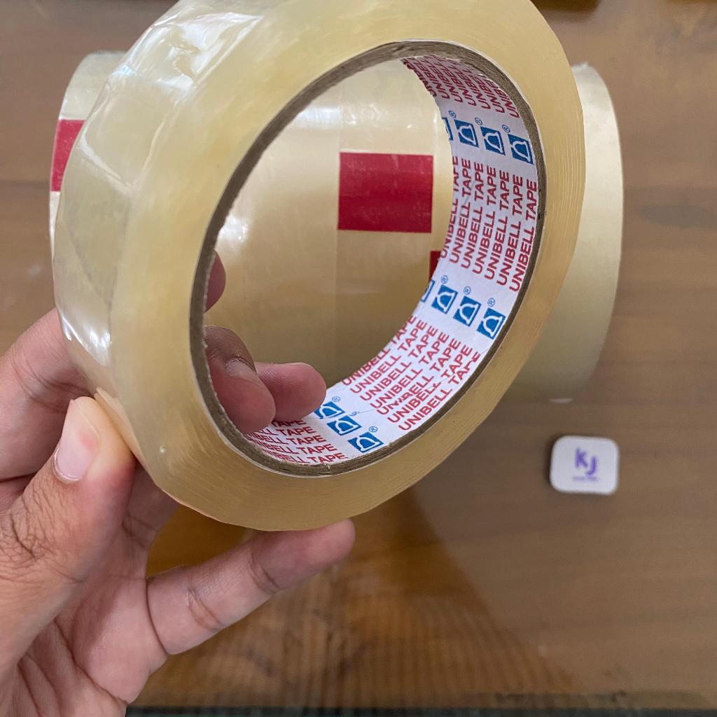 

UNIBELL Lakban Isolasi Solasi Bening OPP 1 inch (24mmx85yd) / OPP Tape panjang 85 yard murah berkualitas