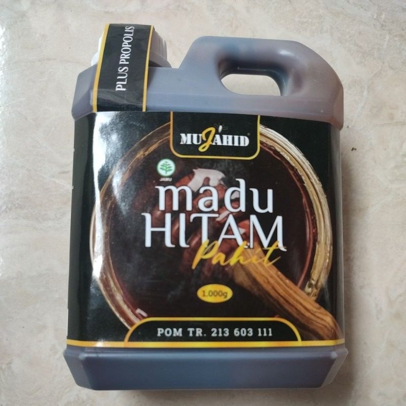 

MADU HITAM PAHIT MUJAHID 1 KG PLUS PROPOLIS