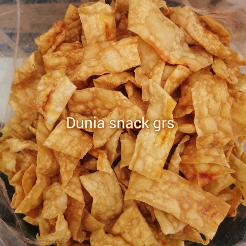 

Keripik Pangsit Pedas 300Gr / Kulit Pangsit Goreng Pedas Gurih