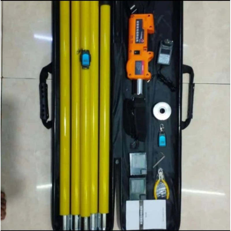 tongkat/ alat merapikan kabel