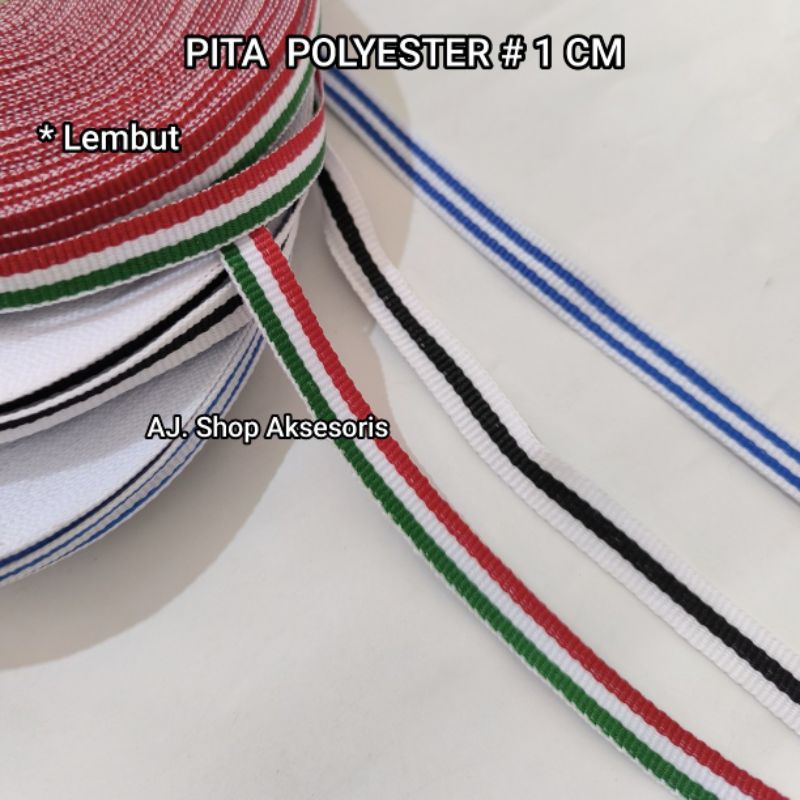 PITA POLYESTER LEBAR 1 CM . 3/8 INCH HARGA  PER ROLL