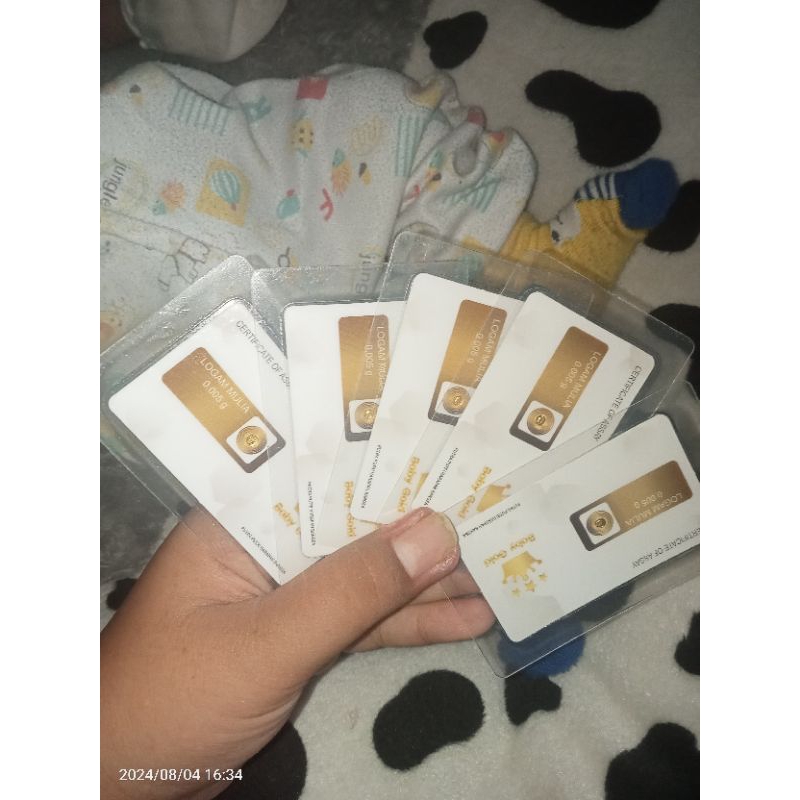 emas baby gold 0.005 gram 5 pcs