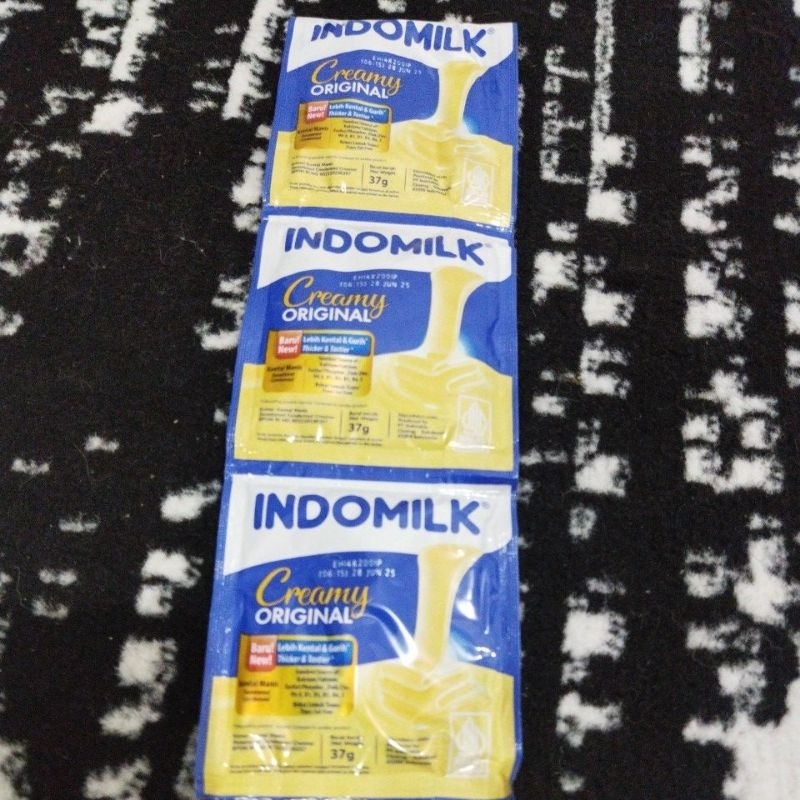 

indomilk sachet susu kental manis putih renceng isi 6 sachet