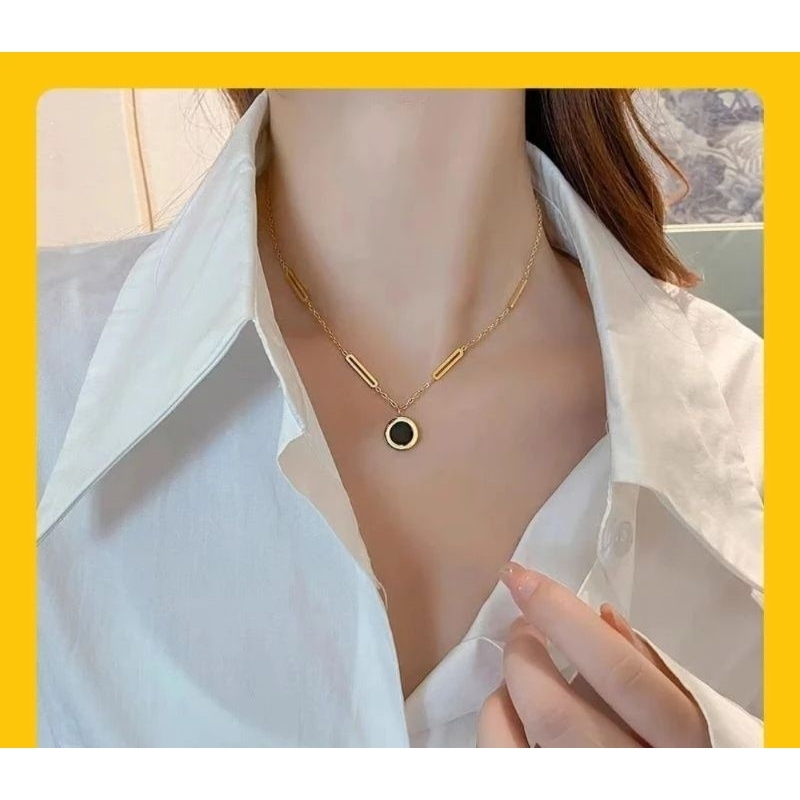 kalung titanium motif buah hitam wanita