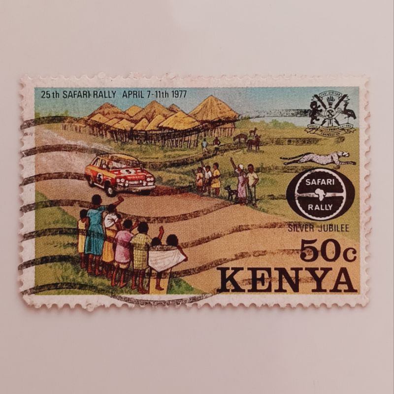 

(AA) Perangko Kenya 1977 25 years Safari Rally - Automobile passing through village 50c Used