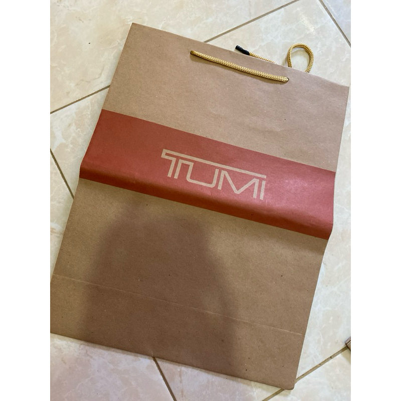 

preloved tumi paperbag