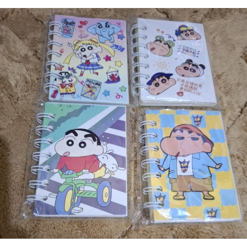 

buku kecil karakter sinchan