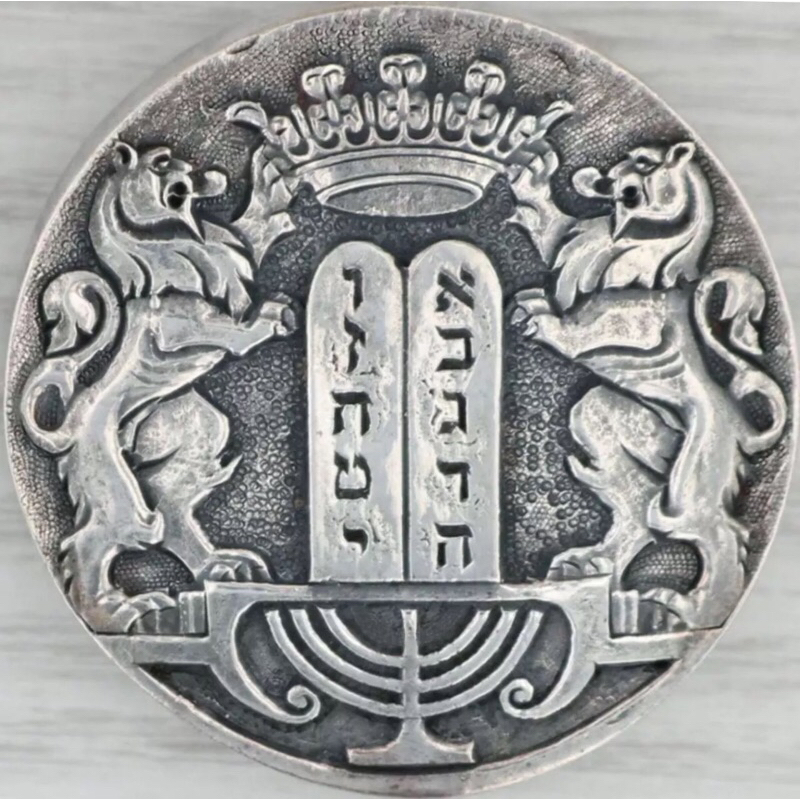 ukiran logo dua singa kayu jati.