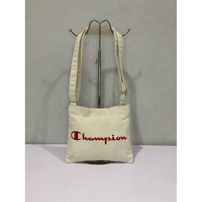 tas sling Champion
