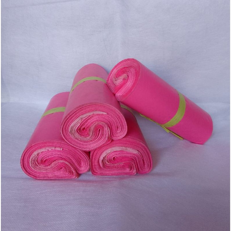 

Polymailer warna pink / Plastik Packing dengan perekat ukuran 17x30