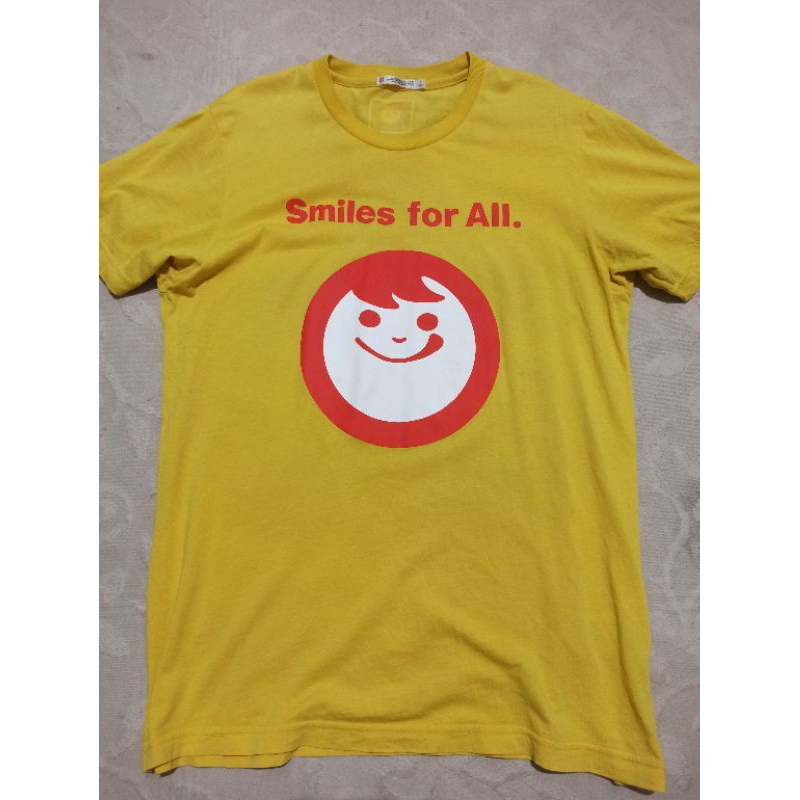 Baju kaos uniqlo UT smile yellow