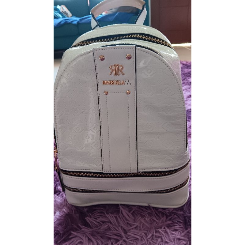 Tas Backpack Sling River Island BARU  Original ada cacat nya huruf paling belakang hilang ya
