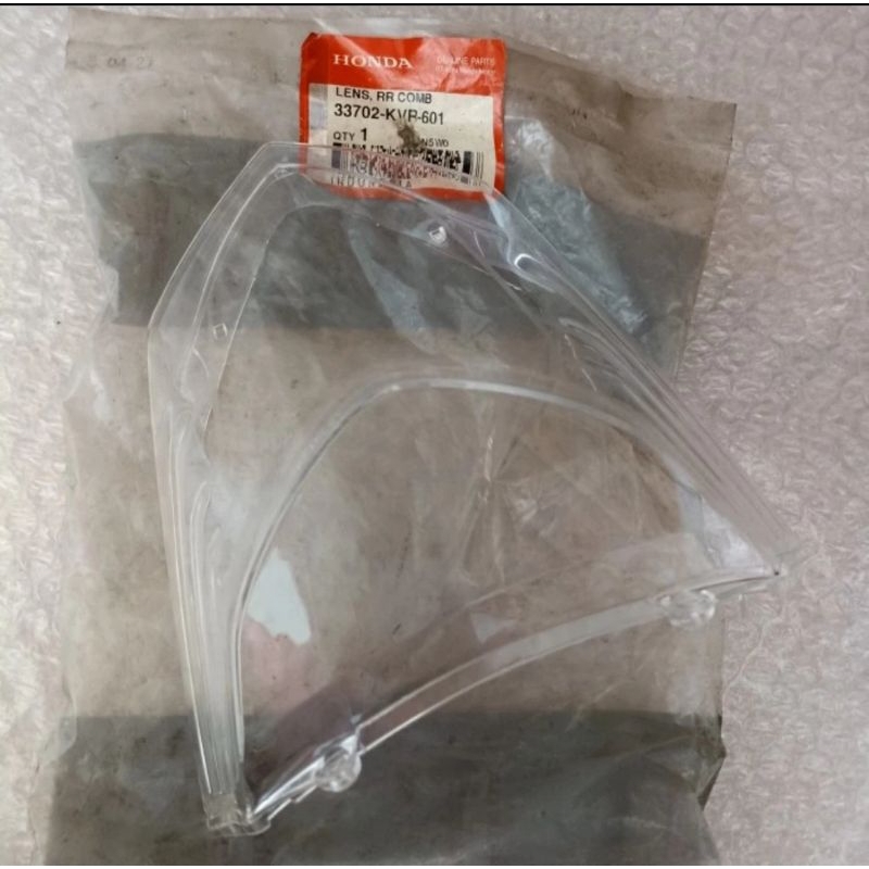 MIKA KACA LAMPU STOP REM BELAKANG HONDA REVO 100 LAMA LANCIP STANLEY AHM 33702-KVR-601 ORIGINAL ASLI