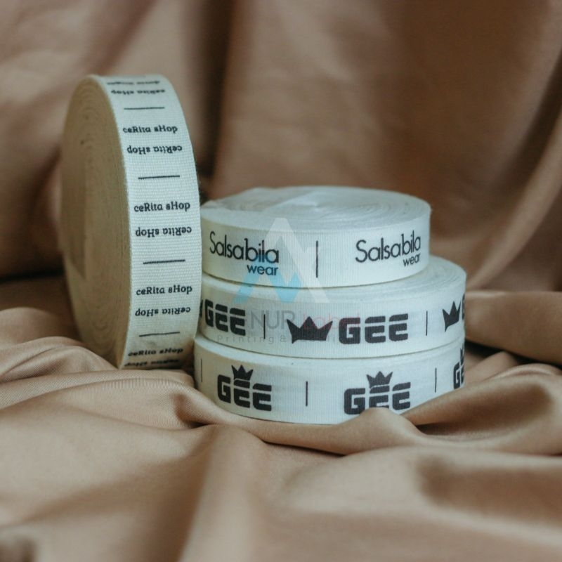 

label baju custom nama label hijab label gamis syar'i label katun import woven damask