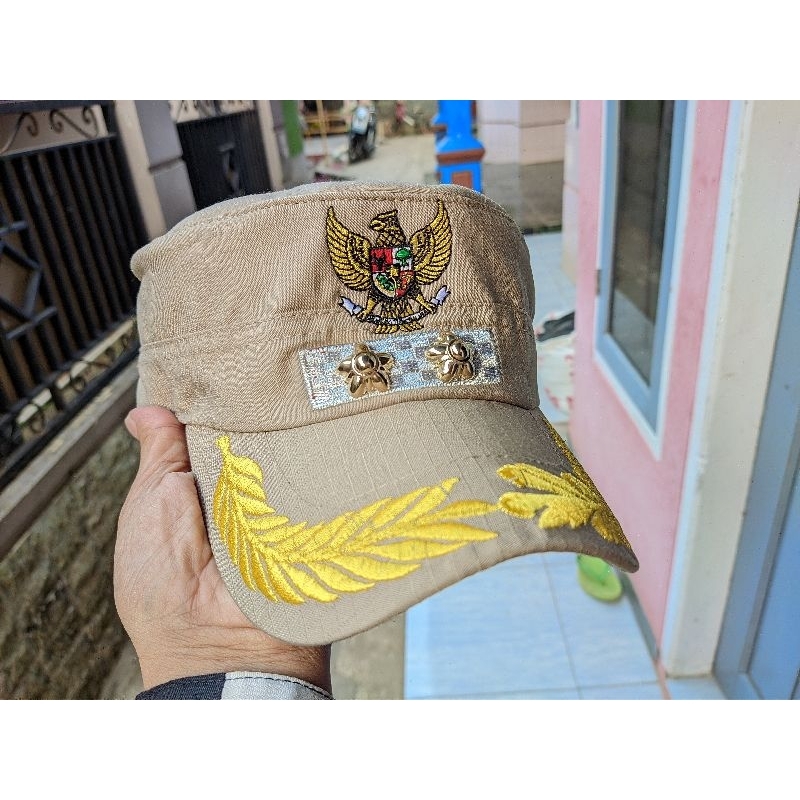 Topi Komando kades lurah terbaru