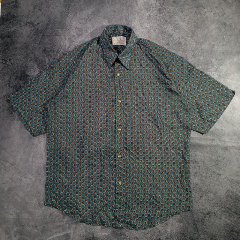 Kemeja motif bekas second