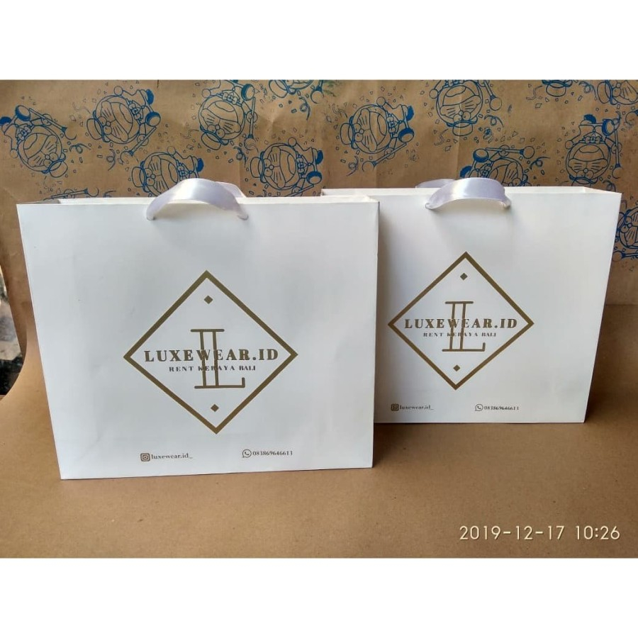 

Custom paperbag tali pita P30 L8 T26 ivory putih glossy