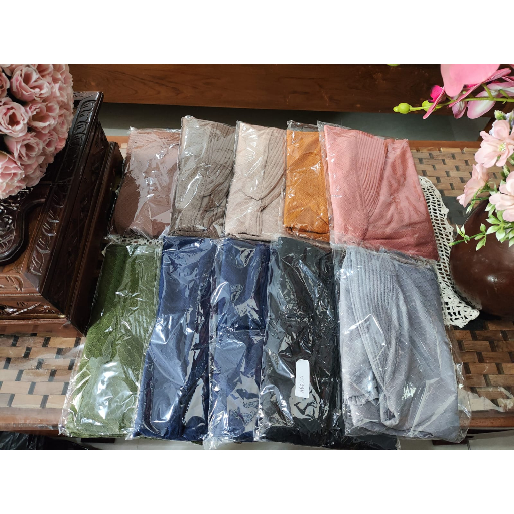 Kerudung bergo standart bahan jersey bertekstur dengan rampel depan, adem, ringan, jatuh, antem dan 