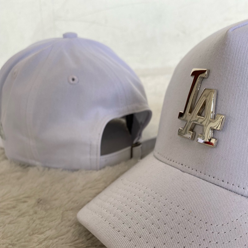 TOPI LA PUTIH LOGO SILVER BESI ORIGINAL PREMIUM